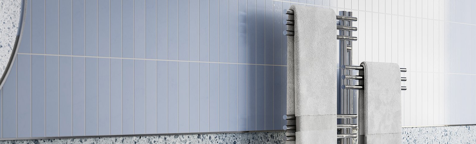Loft Duo 12 Bar heated towel rail 1000mm wide on blue tiled wall